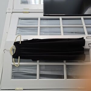 A lightweight dressy black dress .